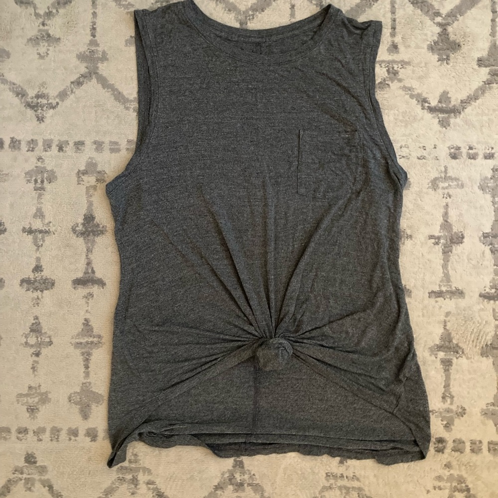 Active top with tie knot on front.